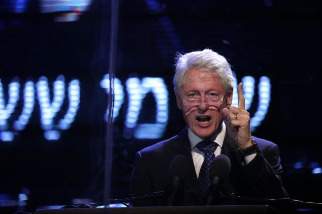 Former president of the United States Bill Clinton delivers his speech during a commemorative rally in memory of late Israeli prime minister Yitzhak Rabin, at Rabin Square in the Israeli coastal city of Tel Aviv on October 31, 2015. The rally is part of commemorations marking the 20th anniversary of Rabin's killing by a right-wing Jewish extremist. AFP PHOTO / THOMAS COEX (Photo credit should read THOMAS COEX/AFP/Getty Images)