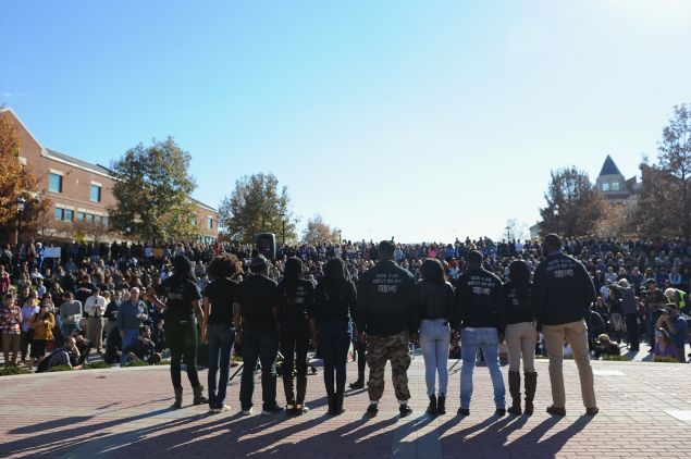 COLUMBIA, MO - NOVEMBER 9: Members of the Concerned Student 1950 movement speak to the crowd of students on the campus of University of Missouri - Columbia on November 9, 2015 in Columbia, Missouri. Students celebrate the resignation of University of Missouri System President Tim Wolfe amid allegations of racism. (Photo by Michael B. Thomas/Getty Images)