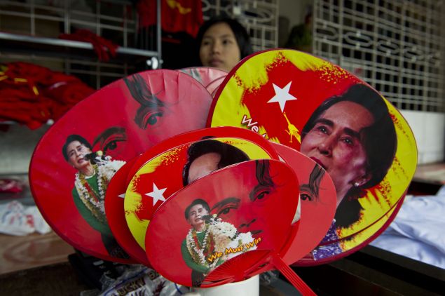 Fans with portraits of Myanmar opposition leader Aung San Suu Kyi ROMEO GACAD/AFP/Getty Images)