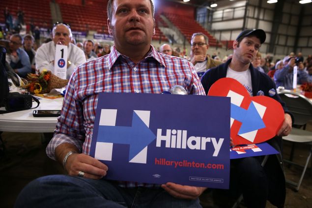 AMES, IA - NOVEMBER 15: Supporters of Democratic presidential candidate Hillary Clinton listen to her stump speech during the Central Iowa Democrats fall barbecue November 15, 2015 at Hansen Agriculture Student Learning Center of Iowa State University in Ames, Iowa. Clinton continued to campaign for the nomination from the Democratic Party. (Photo by Alex Wong/Getty Images)