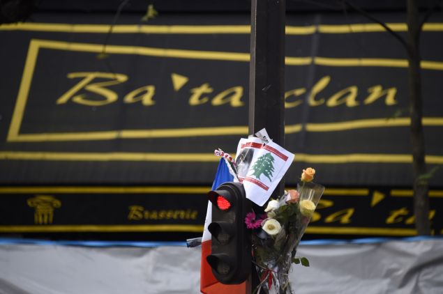 Flowers are laid outside the Bataclan theatre in Paris, on November 18, 2015. (DOMINIQUE FAGET/AFP/Getty Images)