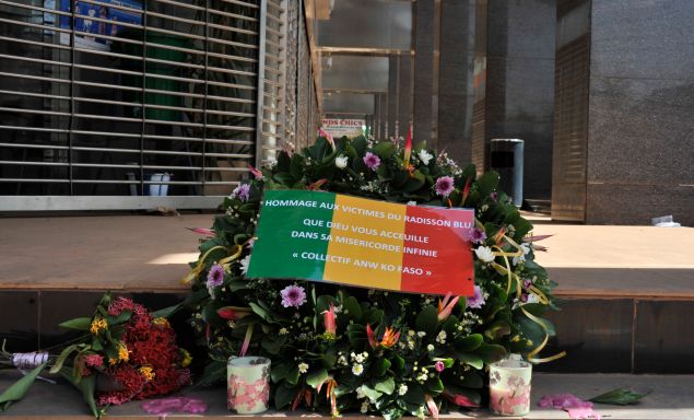 Flowers have been laid at the entrance the Radisson Blu hotel in Bamako on November 24, 2015, in tribute to the victims four days after the deadly terrorist attack that left 27 people killed. (HABIBOU KOUYATE/AFP/Getty Images).