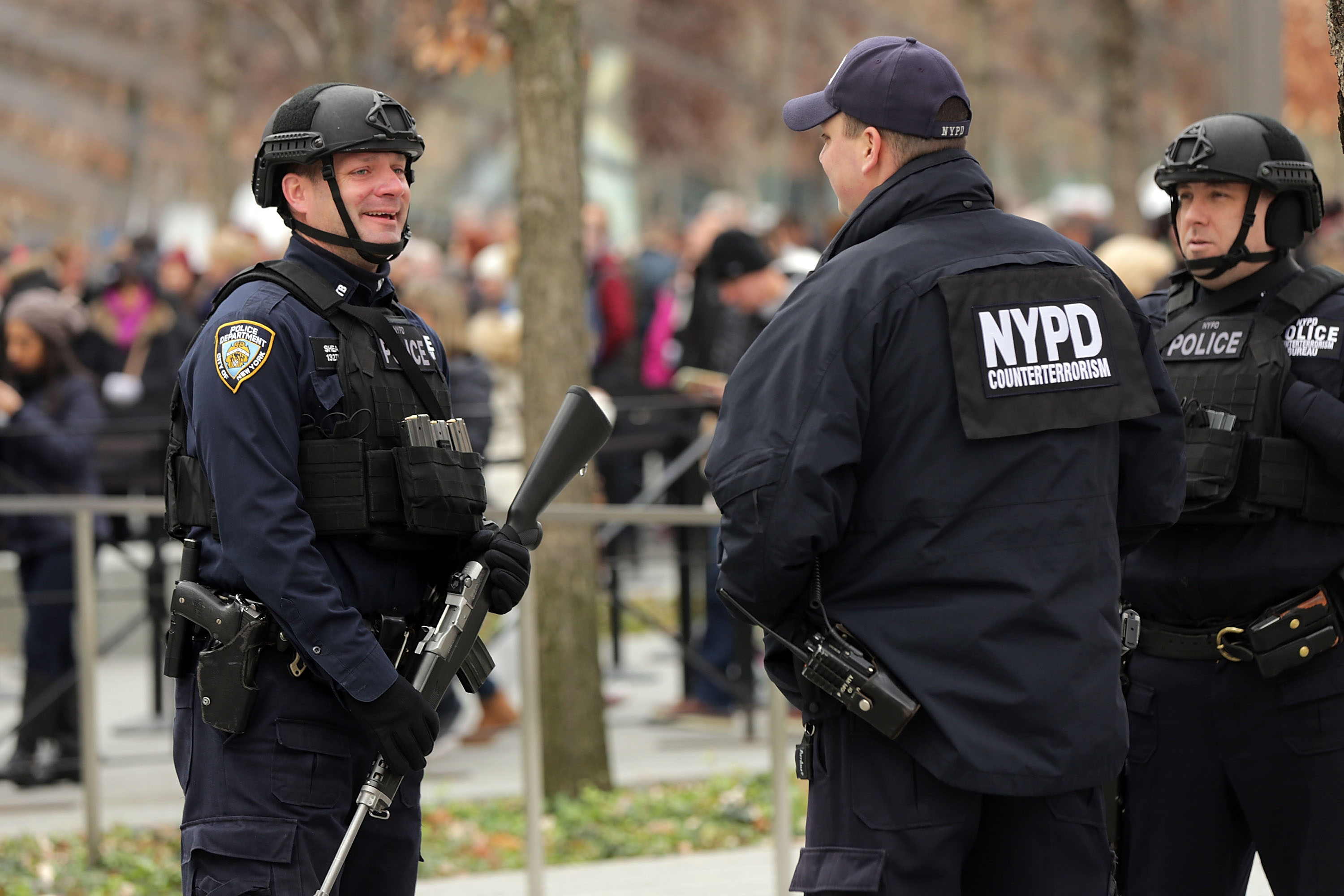 New York City police officers stand guard near One World Trade Center in lower Manhattan on November 24, 2015 (Photo by Spencer Platt/Getty Images)