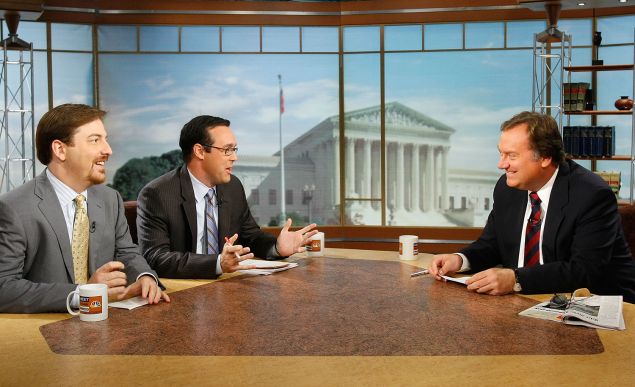 (L-R) Chuck Todd of NBC News and Chris Cillizza of WashingtonPost.com chat with the late Tim Russert during a taping of Meet the Press (Photo by Alex Wong/Getty Images for Meet the Press).