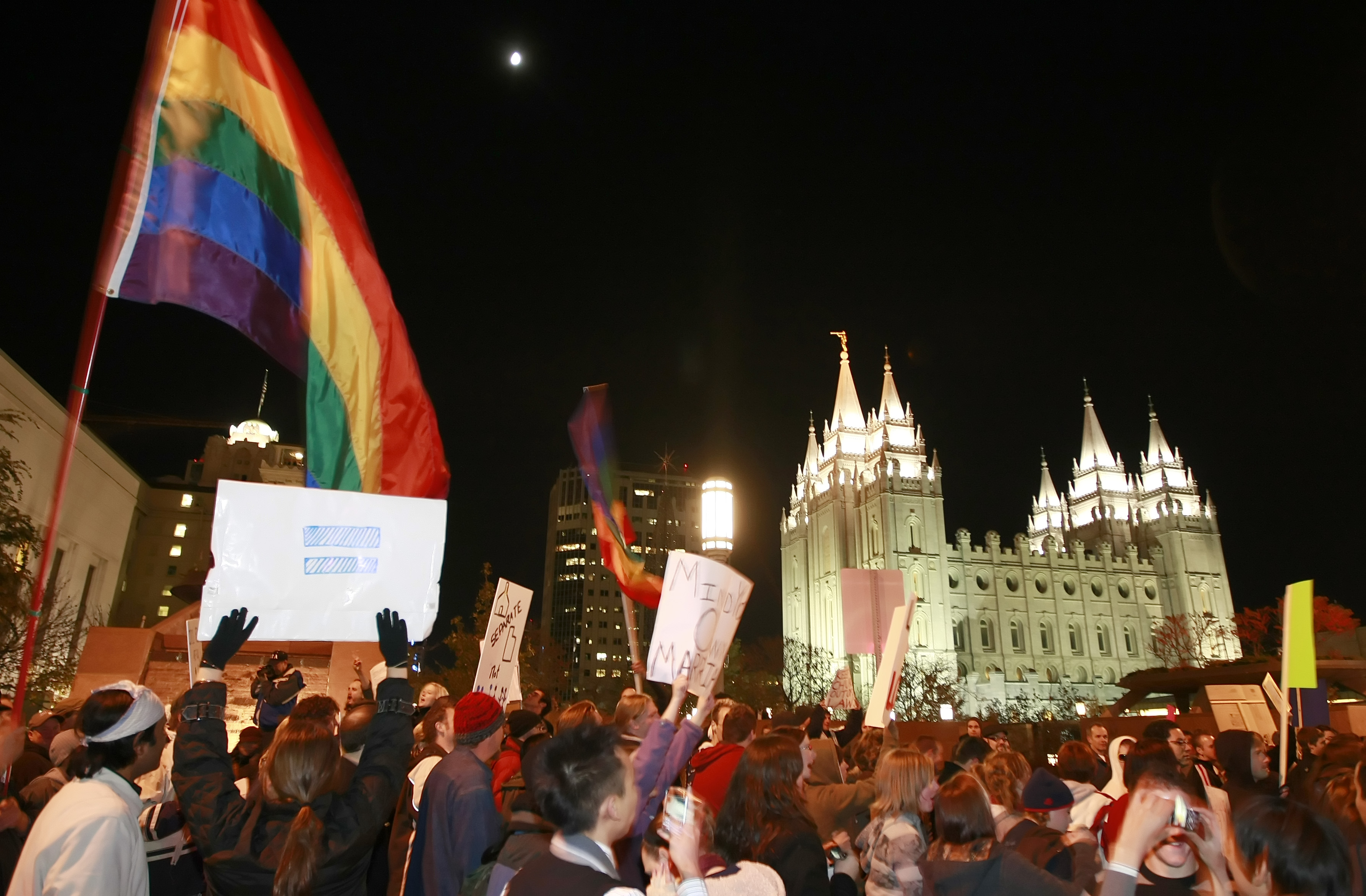 SALT LAKE CITY, UT - NOVEMBER 7: Thousands of people protest against the passage of California's Proposition 8 outside the world headquarters of Temple of the Church of Jesus Christ of Latter Day Saints November 7, 2008 in Salt Lake City, Utah. The protesters were marching against the Mormon church's support for the ballot measure that passed on November 4 making gay marriage illegal. (Photo by George Frey/Getty Images)
