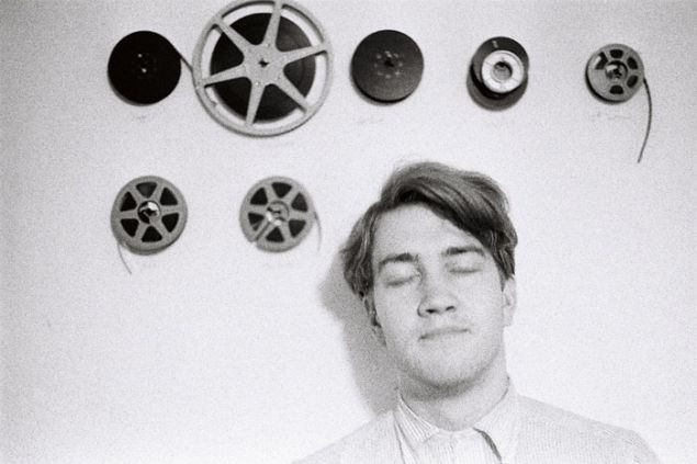 David Lynch With Film Reels, by C. K. Williams