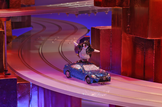 A mini crystal-encrusted car (Photo: Courtesy Barneys).
