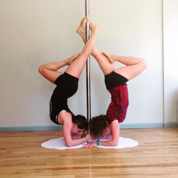 Start practicing your inversions (Photo: Yoga Pole Studio).
