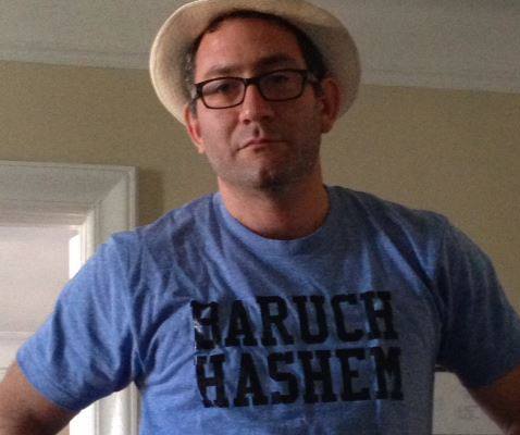 Prof. Schreier in a t-shirt that reads 'Baruch Hashem.' (Facebook)