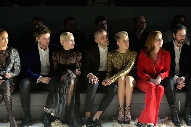 Jennifer Lopez, Patrick Schwarzenegger, Miley Cyrus, Romain Dauriac, Scarlett Johansson, Amy Adams, and actor Darren Le Gallo in the front row (Photo: Charley Gallay/Getty Images for Tom Ford)