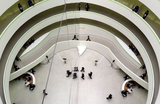 The Guggenheim's Frank Lloyd Wright designed rotunda provides perfect acoustics for a choral concert. (STAN HONDA/AFP/Getty Images)