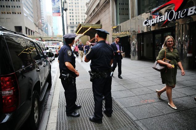 NEW YORK, NY - SEPTEMBER 10: Police are viewed outside of the Grand Hyatt hotel in Manhattan following the mistaken arrest of James Blake, a retired top-10 professional tennis player on September 10, 2015 in New York City. Blake, who is black, has said he was slammed to the ground outside his hotel in Midtown Manhattan while waiting to go to the U.S. Open tennis tournament on Wednesday. New York Police Department Commissioner William J. Bratton has apoligized for the incident and an investigation is continuing. (Photo by Spencer Platt/Getty Images)
