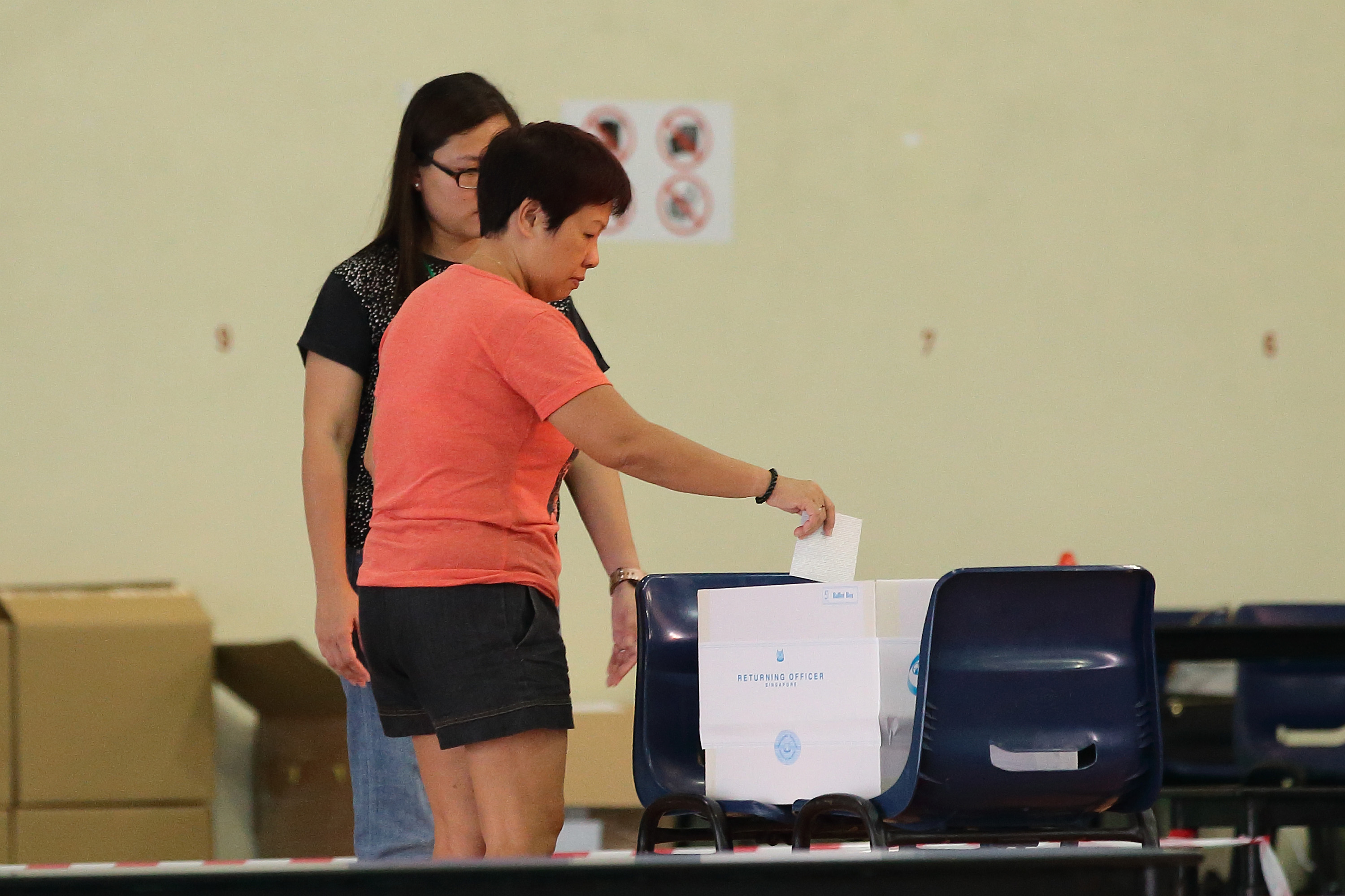 A resident casts a vote in Singapore's national election September 11 during the. (Photo: Suhaimi Abdullah/Getty Images)