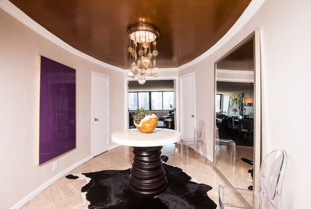 The chandelier in the foyer (Photo: Emily Assiran for Observer).