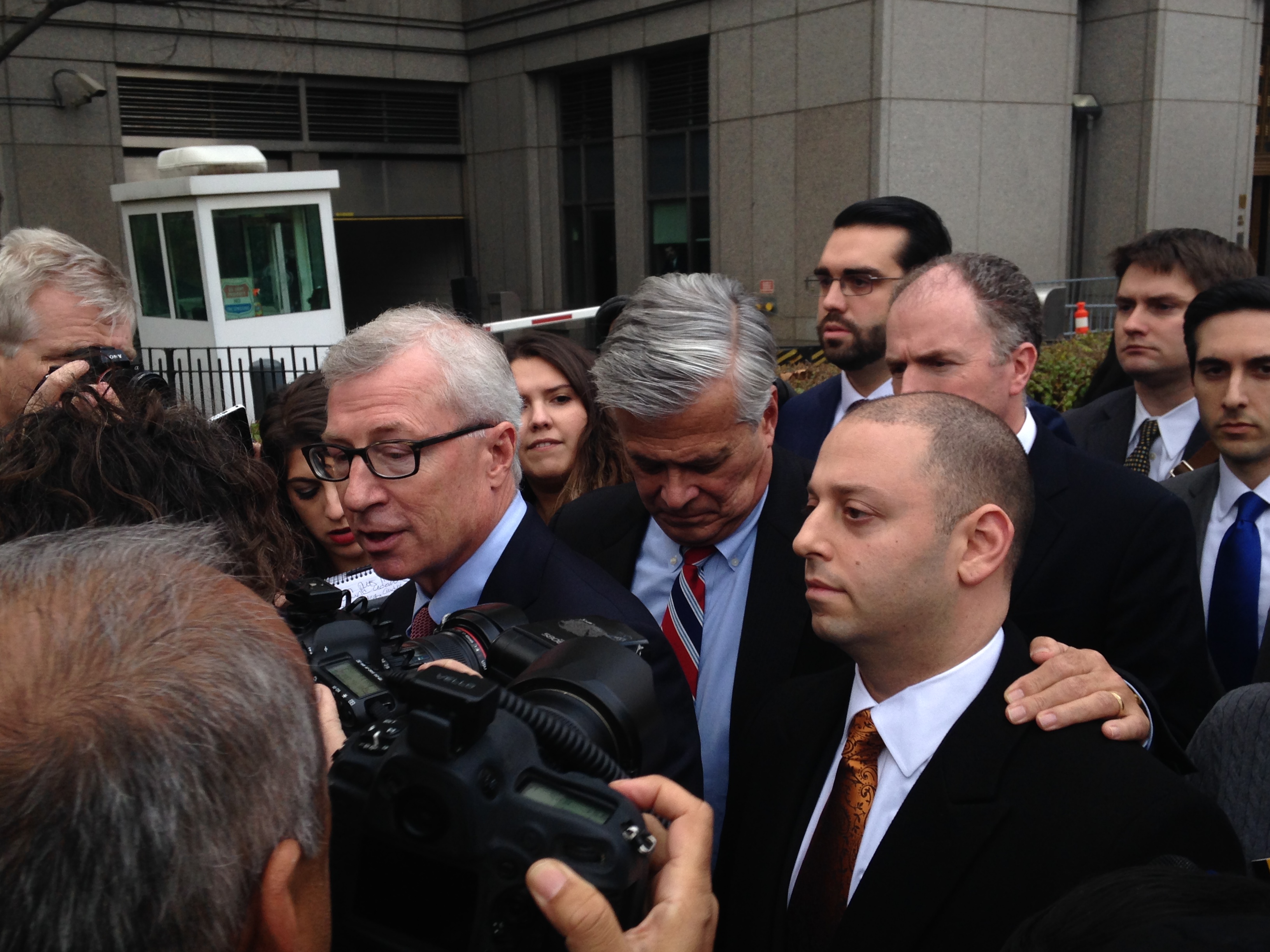 Former State Senate Majority Leader Dean Skelos and his son Adam leave court after being found guilty. (Photo: Will Bredderman for Observer)