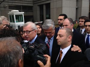 Former State Senate Majority Leader Dean Skelos and his son Adam leave court after being found guilty.