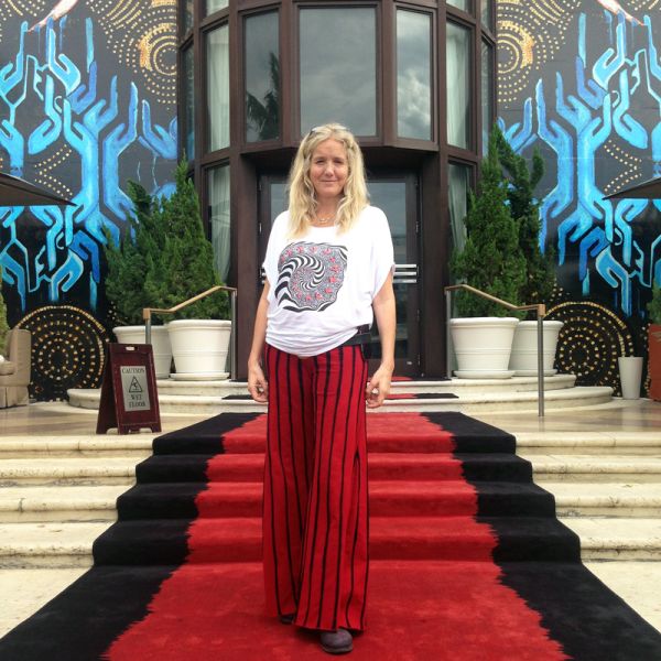 Laura Kimpton with her art on the facade of the SLS South Beach Hotel. (Photo: Courtesy of Renee Riccardo)