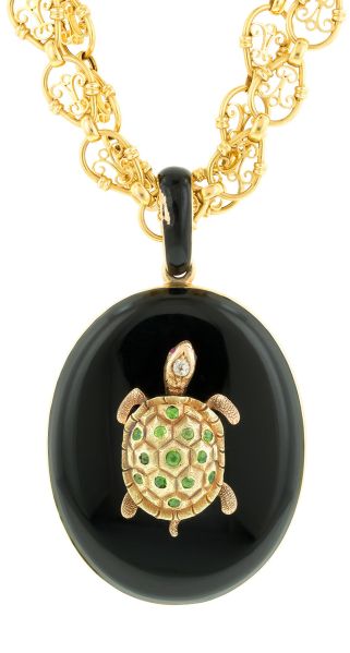 Locket with demantoid garnet, old European diamond, ruby, onyx and gold, (ca. 1880). (Photo: Courtesy Elizabeth Doyle)