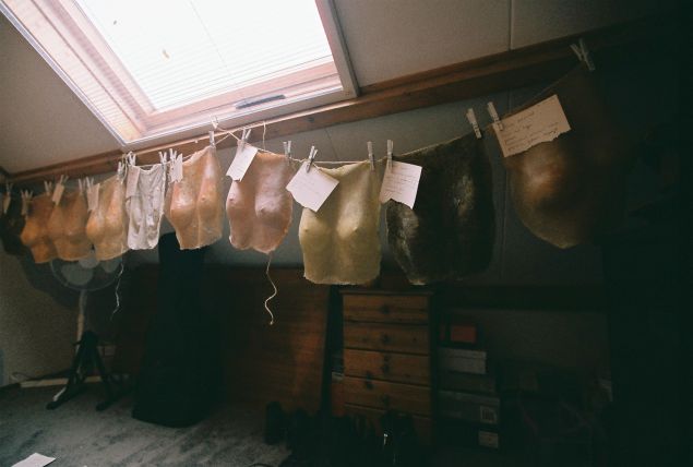 Tops with production notes hanging to dry. (Photo: Esmay Wagermans)