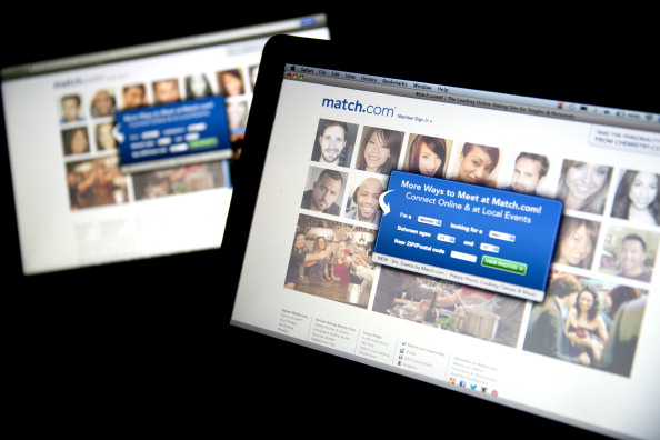The Match.com website is displayed on laptop computers arranged for a photograph in Washington, D.C., U.S., on Thursday, Dec. 19, 2013. IAC/InterActiveCorp, the Internet holding company controlled by billionaire Barry Diller, plans to turn its Match dating services into a separate business with its own chairman, setting the stage for a potential spinoff. Photographer: Andrew Harrer/Bloomberg via Getty Images