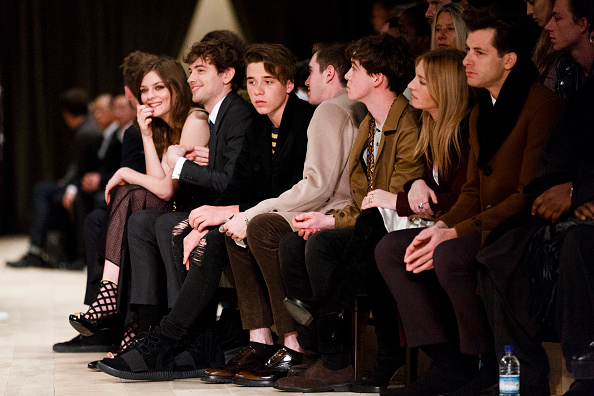 LONDON, ENGLAND - JANUARY 11: Amber Atherton, Josh Whitehouse' Brooklyn Beckham and Gabriel Day-Lewis attend the Burberry show during The London Collections Men AW16 at Kensington Gardens on January 11, 2016 in London, England. (Photo by Tristan Fewings/Getty Images)