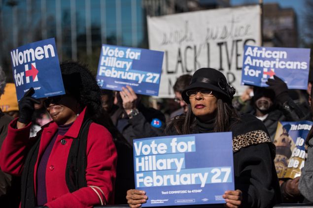 COLUMBIA, SC - JANUARY 18: People hold Hillary Clinton campaign signs during the King Day at the Dome rally at the S.C. State House at the S.C. State House January 18, 2016 in Columbia, South Carolina. The event drew appearances from Democratic presidential candidates Sen. Bernie Sanders, I-Vt, former Maryland Gov. Martin O'Malley and Hillary Clinton. (Photo by Sean Rayford/Getty Images)