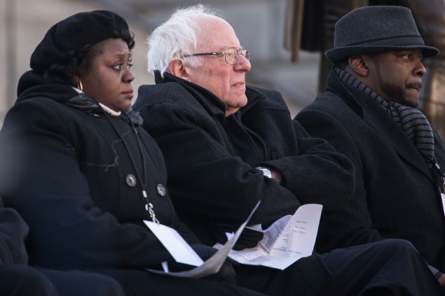 COLUMBIA, SC - JANUARY 18: Democratic presidential candidate Sen. Bernie Sanders (I-VT) (C) listens to a speaker during the King Day at the Dome rally at the S.C. State House January 18, 2016 in Columbia, South Carolina. The event drew appearances from Democratic presidential candidates Sen. Bernie Sanders, I-Vt, former Maryland Gov. Martin O'Malley and Hillary Clinton. (Photo by Sean Rayford/Getty Images)
