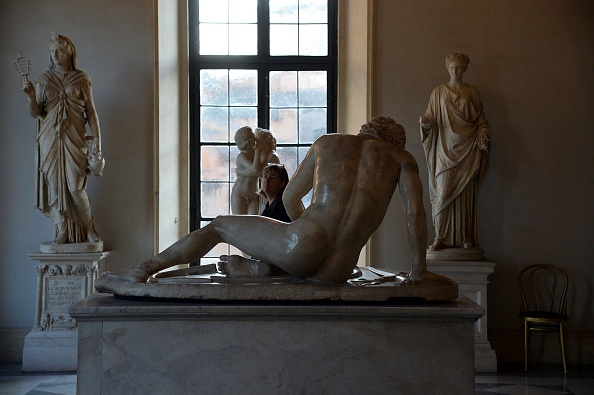 A visitor walks past marble statues on display at Rome's Capitoline Museum (Musei Capitolini) on Capitol Hill on January 26, 2016. Italy's desire to court visiting Iranian President Hassan Rouhani extended to covering up classical nude sculptures in the Capitoline Museum, where he met Prime Minister Matteo Renzi, it emerged on Tuesday. / AFP / FILIPPO MONTEFORTE (Photo credit should read FILIPPO MONTEFORTE/AFP/Getty Images)
