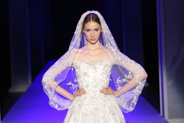PARIS, FRANCE - JANUARY 29: A model wears the bridal gown closing the Ralph & Russo show as part of Paris Fashion Week Haute Couture Spring/Summer 2015 on January 29, 2015 in Paris, France. (Photo by Richard Bord/Getty Images for Ralph&Russo)