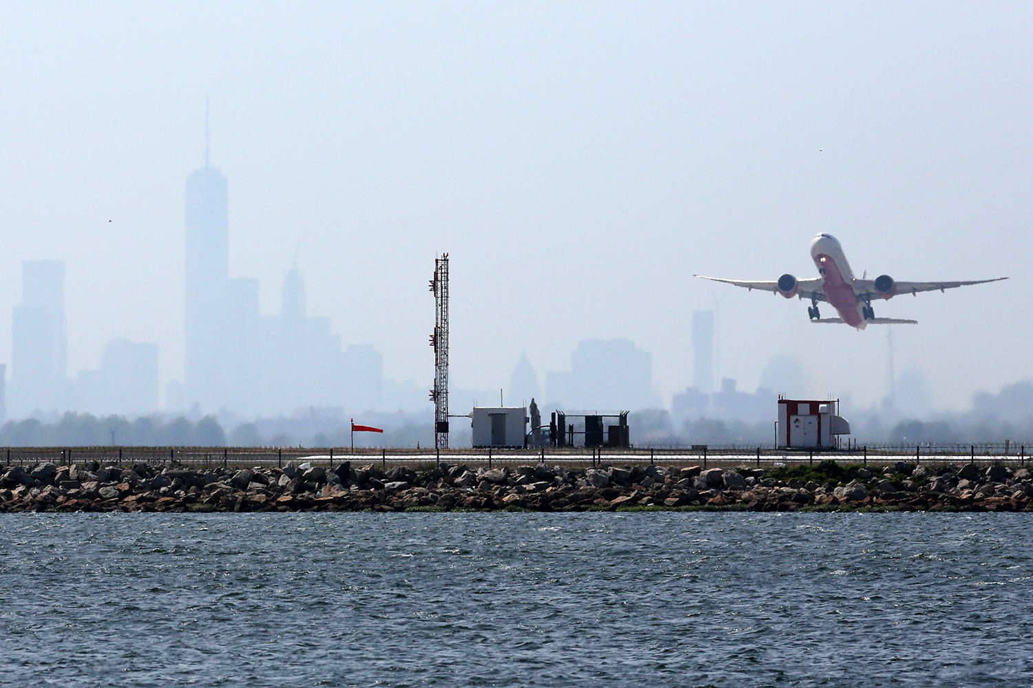 An aircraft takes off from New York's John F. Kennedy Airport (TREVOR COLLENS/AFP/Getty Images).