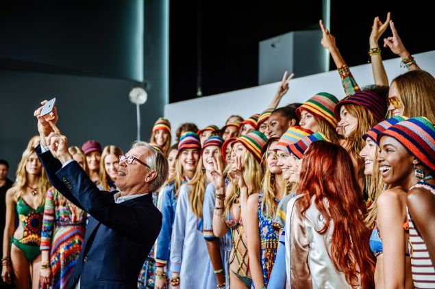 Tommy Hilfiger snaps a selfie with the models at his Spring 2016 show (Photo: Grant Lamos IV/Getty Images for Tommy Hilfiger).