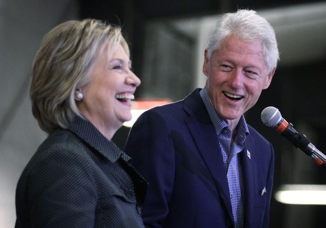 AMES, IA - NOVEMBER 15: Democratic presidential candidate Hillary Clinton (L) and her husband and former President Bill Clinton share a moment on stage during the Central Iowa Democrats fall barbecue November 15, 2015 at Hansen Agriculture Student Learning Center of Iowa State University in Ames, Iowa. Clinton continued to campaign for the nomination from the Democratic Party. (Photo by Alex Wong/Getty Images)