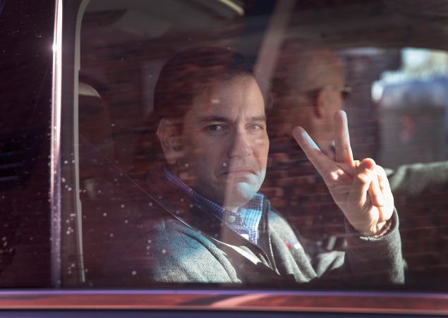 OSKALOOSA, IA - NOVEMBER 21: Republican presidential candidate Sen. Marco Rubio (R-FL) leaves Smokey Row Coffee House following a campaign stop on November 21, 2015 in Oskaloosa, Iowa. Yesterday Rubio participated in the Presidential Family Forum in Des Moines with six of his Republican rivals for the nomination. Rubio has several campaign stops scheduled in the state today. (Photo by Scott Olson/Getty Images)