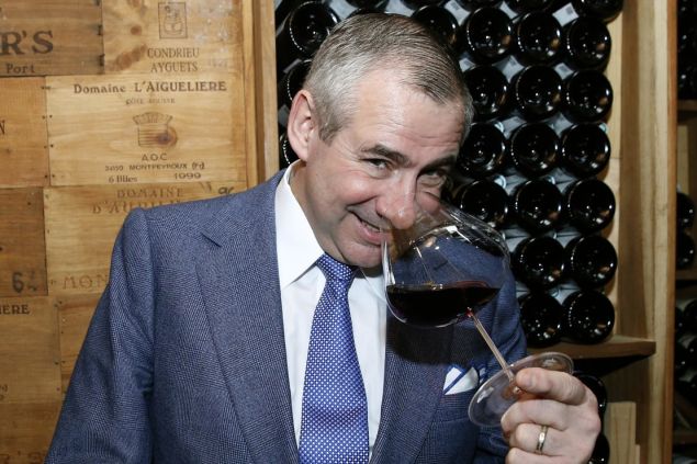 TO GO WITH AFP STORY BY ANNE-LAURE MONDESERT Sommelier at the luxury Hotel George V in Paris for over 15 years, Eric Beaumard, poses in the hotel's wine cellar on November 26, 2015, in Paris. Beaumard takes an inventory of more than 70 wine estates in his book "Les Vins de ma vie" (the wines of my life). AFP PHOTO/ PATRICK KOVARIK / AFP / PATRICK KOVARIK