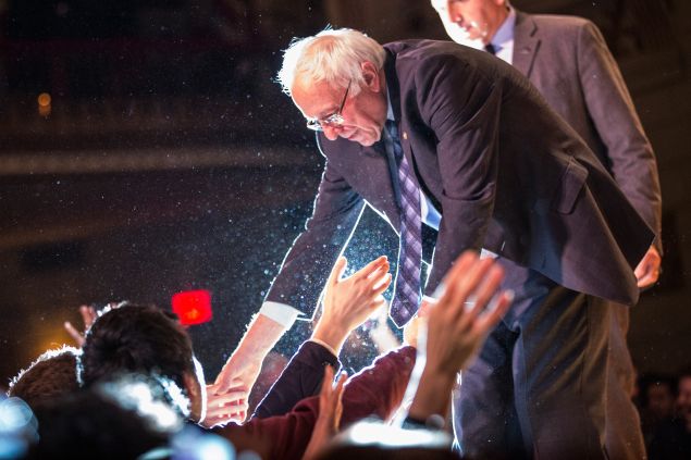 NEW YORK, NY - JANUARY 05: Democratic presidential candidate Sen. Bernie Sanders (I-VT) shakes hands with supporters after outlining his plan to reform the U.S. financial sector on January 5, 2016 in New York City. Sanders is demanding greater financial oversight and greater government action for banks and individuals that break financial laws. (Photo by Andrew Burton/Getty Images)