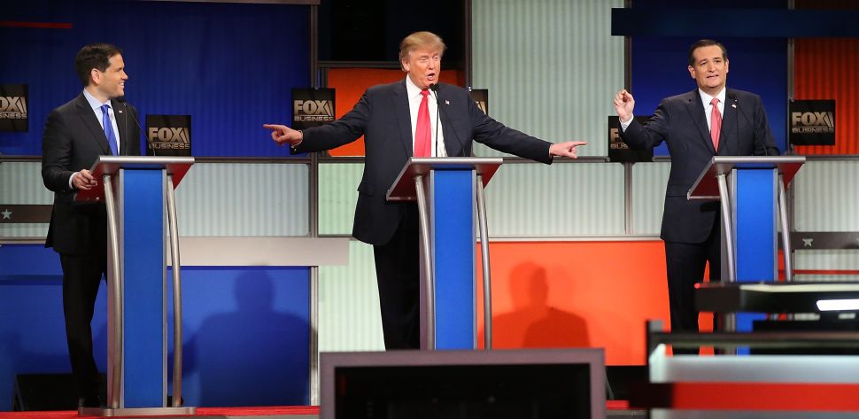 NORTH CHARLESTON, SC - JANUARY 14: Republican presidential candidates (L-R) Sen. Marco Rubio (R-FL), Donald Trump and Sen. Ted Cruz (R-TX) participate in the Fox Business Network Republican presidential debate at the North Charleston Coliseum and Performing Arts Center on January 14, 2016 in North Charleston, South Carolina. The sixth Republican debate is held in two parts, one main debate for the top seven candidates, and another for three other candidates lower in the current polls. (Photo by Scott Olson/Getty Images)