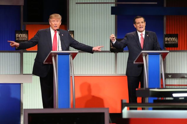 NORTH CHARLESTON, SC - JANUARY 14: Republican presidential candidates (L-R) Donald Trump and Sen. Ted Cruz (R-TX) participate in the Fox Business Network Republican presidential debate at the North Charleston Coliseum and Performing Arts Center on January 14, 2016 in North Charleston, South Carolina. The sixth Republican debate is held in two parts, one main debate for the top seven candidates, and another for three other candidates lower in the current polls. (Photo by Scott Olson/Getty Images)