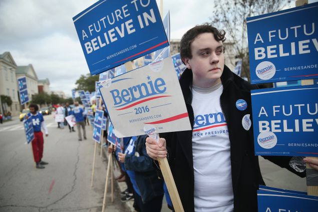 CHARLESTON, SC - JANUARY 17: Supporters of Democratic presidential candidates Senator Bernie Sanders (I-VT) and Hillary Clinton rally outside the Gaillard Center before the start of the NBC News Democratic Candidates Debate on January 17, 2016 in Charleston, South Carolina. This is the final debate for the Democratic candidates before the Iowa caucuses. (Photo by Scott Olson/Getty Images)