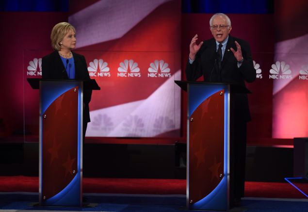 Former Secretary of State Hillary Clinton and Vermont Sen. Bernie Sanders. Not pictured: ex-Maryland Gov. Martin O'Malley (TIMOTHY A. CLARY/AFP/Getty Images)