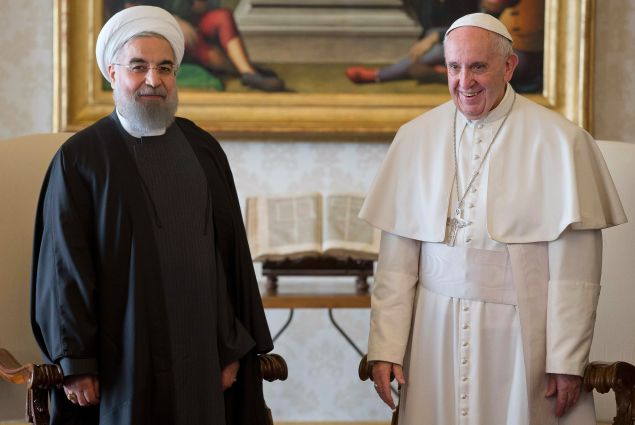 Pope Francis (R) and Iranian President Hassan Rouhani poses after their private audience on January 26, 2016, at the Vatican. Rouhani on January 26 described Iran as the safest and most stable country in the Middle East as he urged international investors to help modernise the country's sanctions-hit economy. On the second day of a landmark visit to Europe, the Iranian leader also pitched the Islamic Republic's potential for companies seeking a base in a region of 300 million people and vowed the government would never interfere in private business deals. / AFP / POOL / ANDREW MEDICHINI (Photo credit should read ANDREW MEDICHINI/AFP/Getty Images)