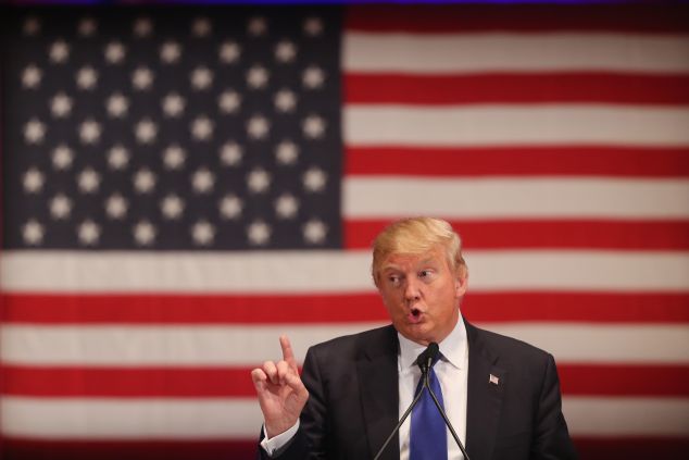 DES MOINES, IA - JANUARY 28: Republican presidential candidate Donald Trump gestures as he speaks to veterans at Drake University on January 28, 2016 in Des Moines, Iowa. Donald Trump held his alternative event to benefit veterans after withdrawing from the televised Fox News/Google GOP debate which airs at the same time. (Photo by Christopher Furlong/Getty Images)
