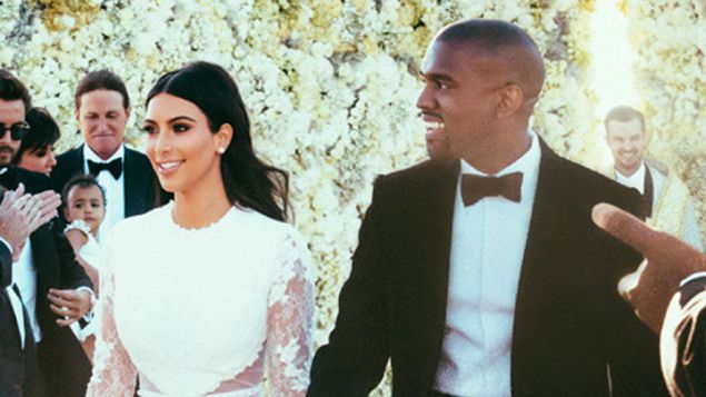Kim Kardashian and Kanye West (foreground) with Rich Wilkerson Jr. (back right).