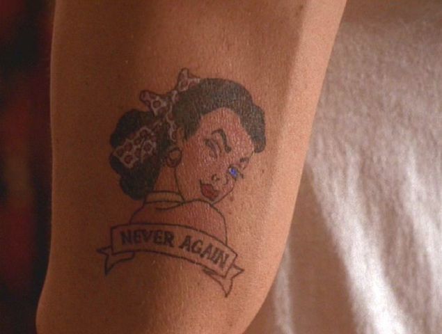 A terrible tattoo with an even more terrible choice of words. (NBC)