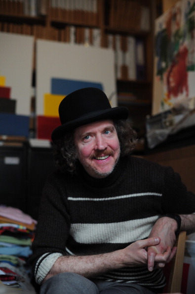 British Turner prize-winning artist Martin Creed poses for a photograph at his east London studio on July 6, 2012. Church bells, bicycle bells, handbells, ship's bells, and even mobile phones will sound across Britain in a "cacophonous, amazing sound" to mark the start of the Olympics, artist Martin Creed told AFP. AFP PHOTO / CARL COURT