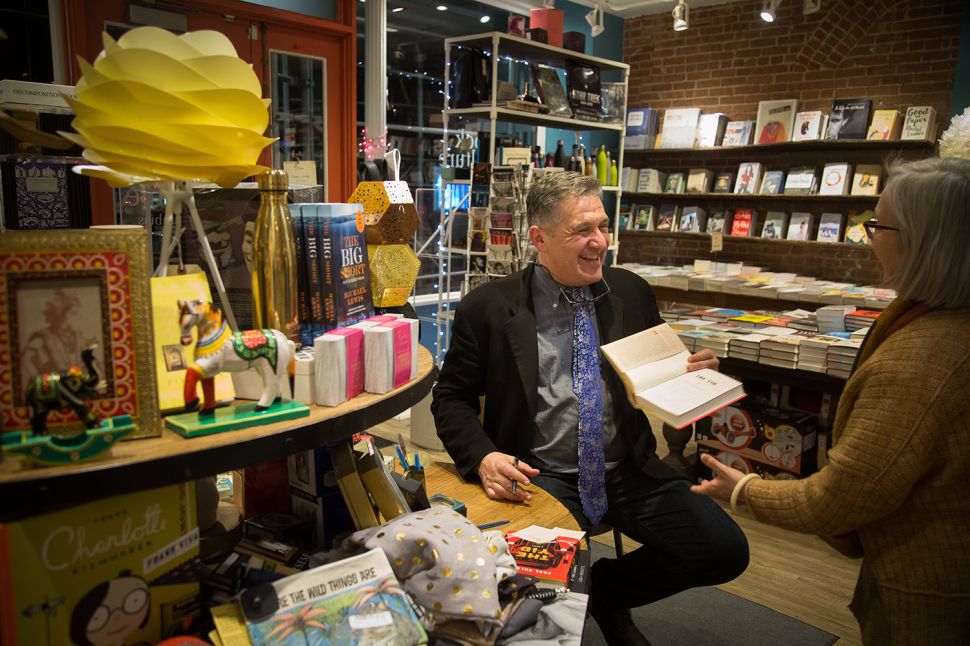 Paul Goldberg signs copies "The Yid" after a reading at Book Culture