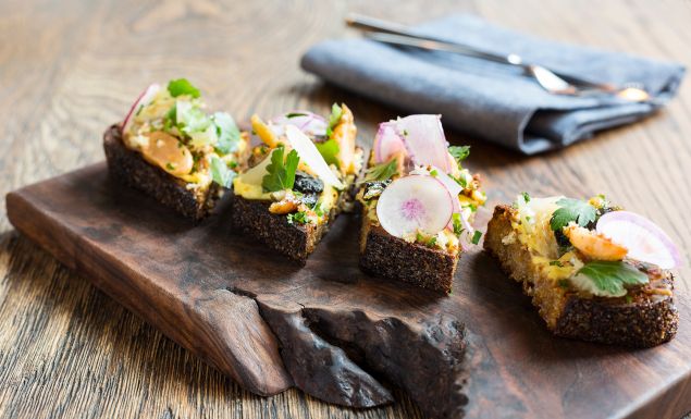 Fresh baked Anadama with smoked eel, spicy radish and parsley.