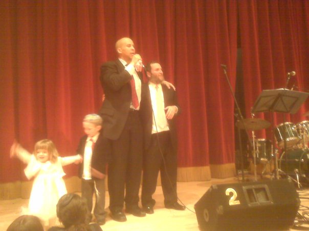 Cory Booker delivers a toast at the bat mitzvah of one of the Boteach daughters, February 2010. 