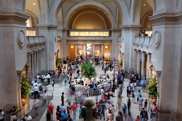 NEW YORK, NY - JULY 30: Hundreds of people walk through the Great Hall at the Metropolitan Museum of Art (the Met) on July 30, 2015 in New York City. The Met recently announced that it drew 6.3 million visitors in the last year, the most since the New York museum began taking crowd statistics more than 40 years ago. Tourism in New York has continued to grow, hitting record numbers in the last few years as people flock to Manhattan and Brooklyn for the cultural institutions, nightlife and shopping.