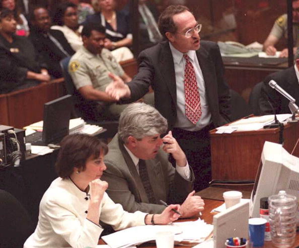 O.J. Simpson defense attorney Alan Dershowitz (standing) pictured during the famous murder trial.