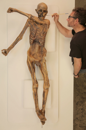 Mr. Staab working on a replica of "Otzi the Iceman."